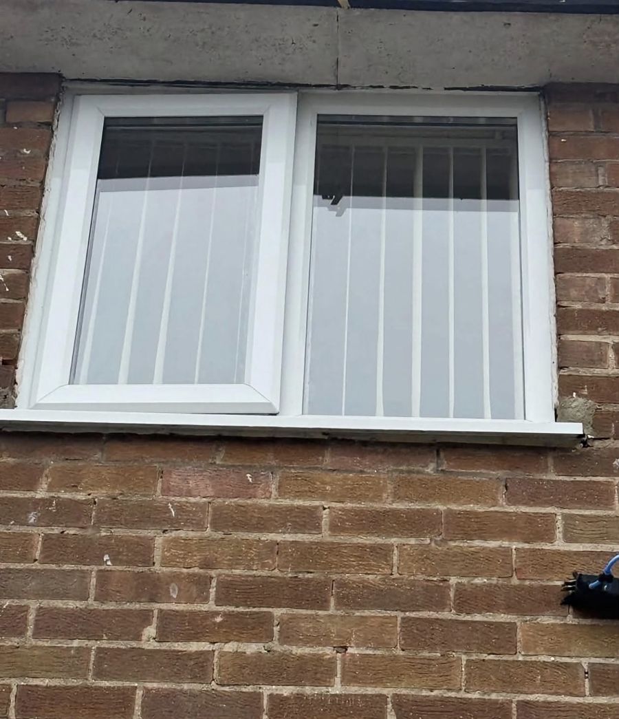 The same window with spotless glass after cleaning