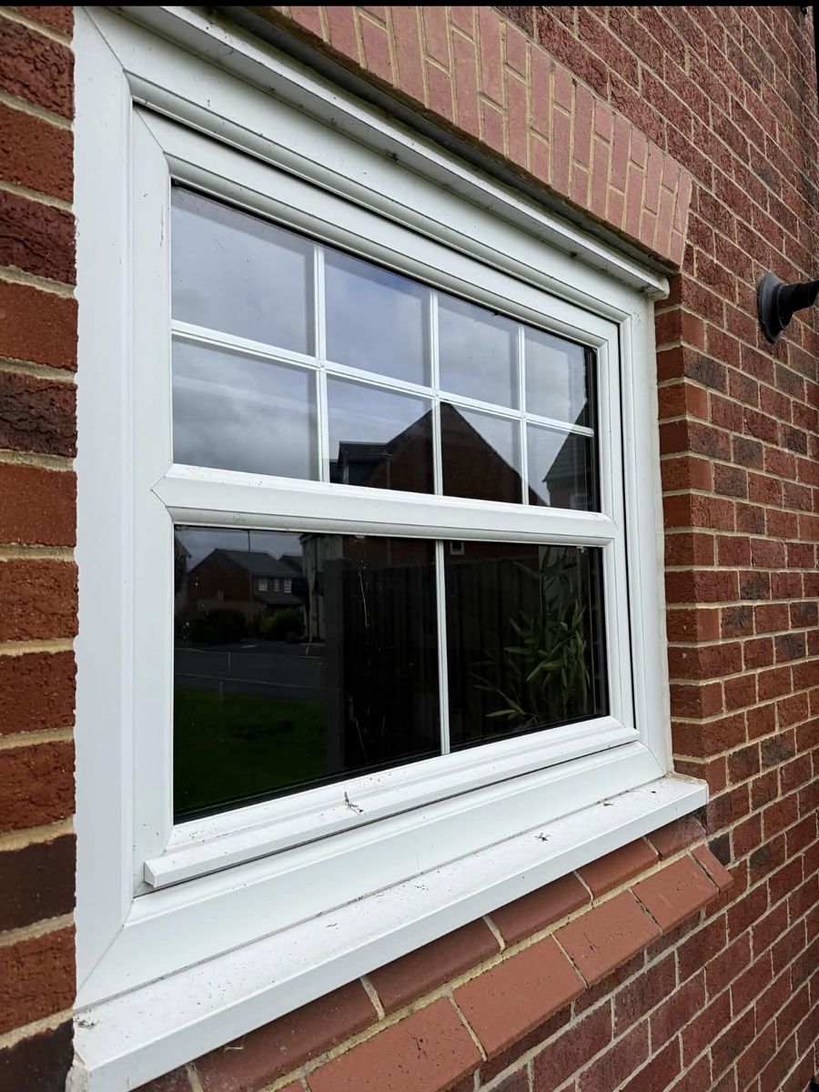 White window with dirty sill and frames before cleaning